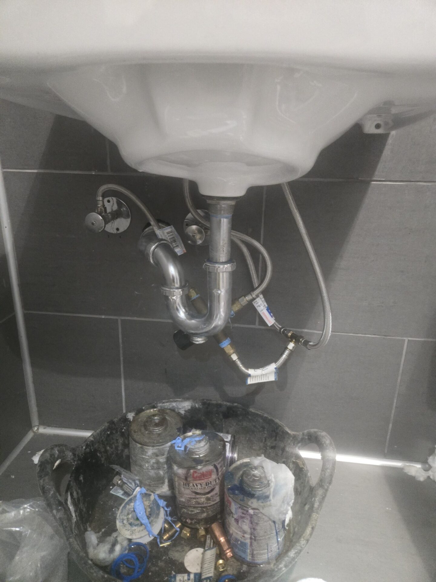 Local Plumber Mesquite TX plumber installing bathroom sink
